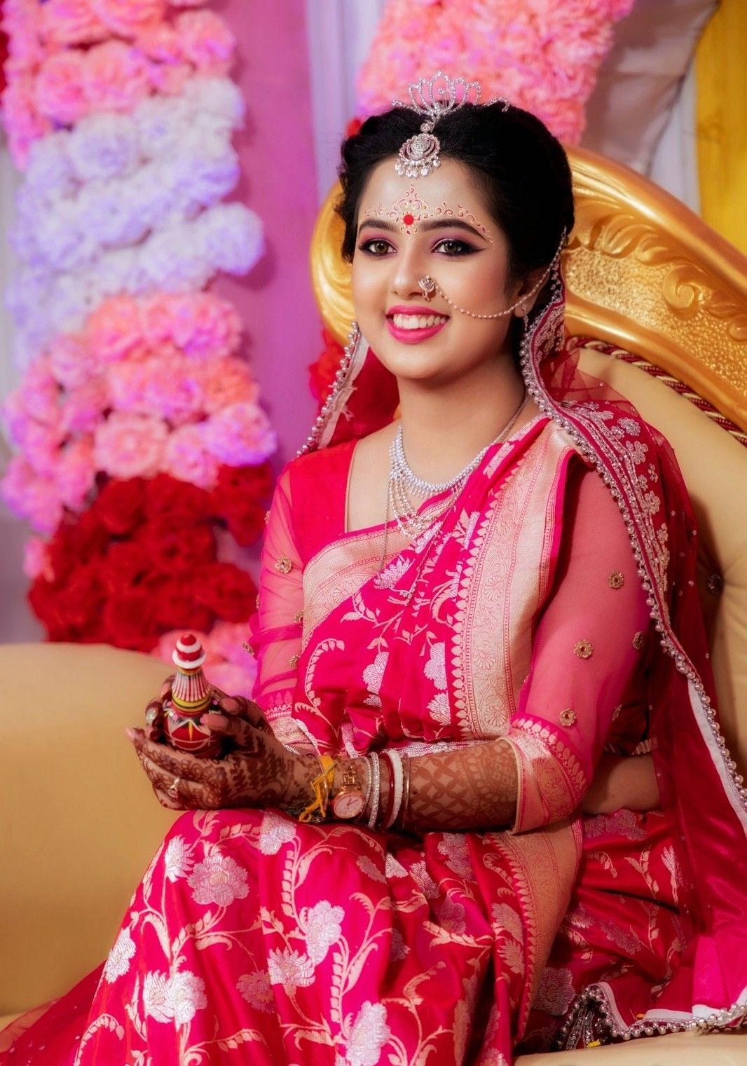 Bengali bride in pink benarasi hotsell